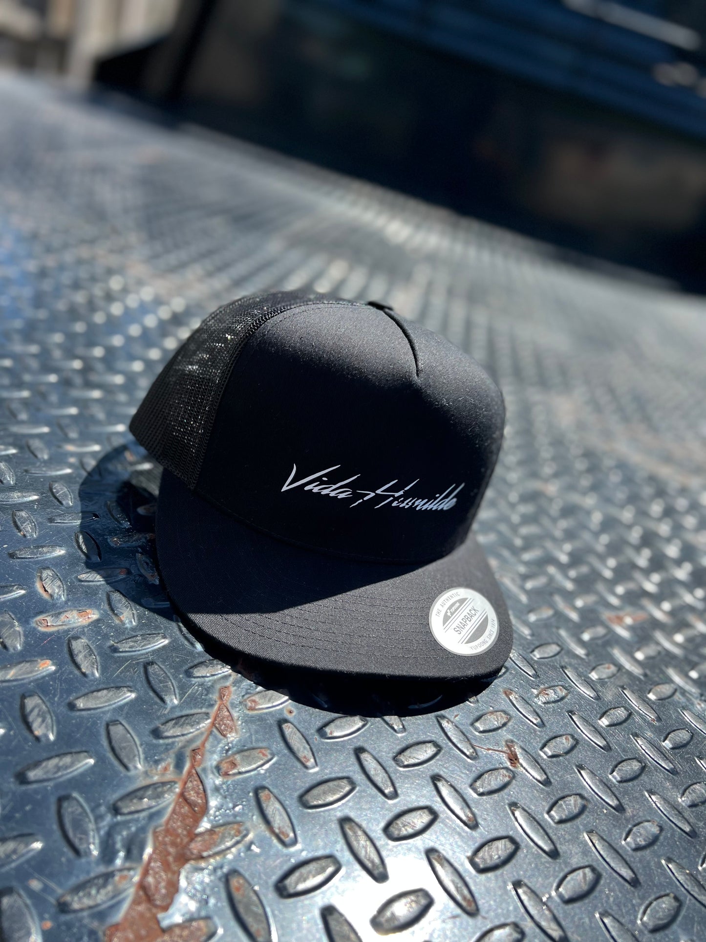 Black Vida humilde trucker hat