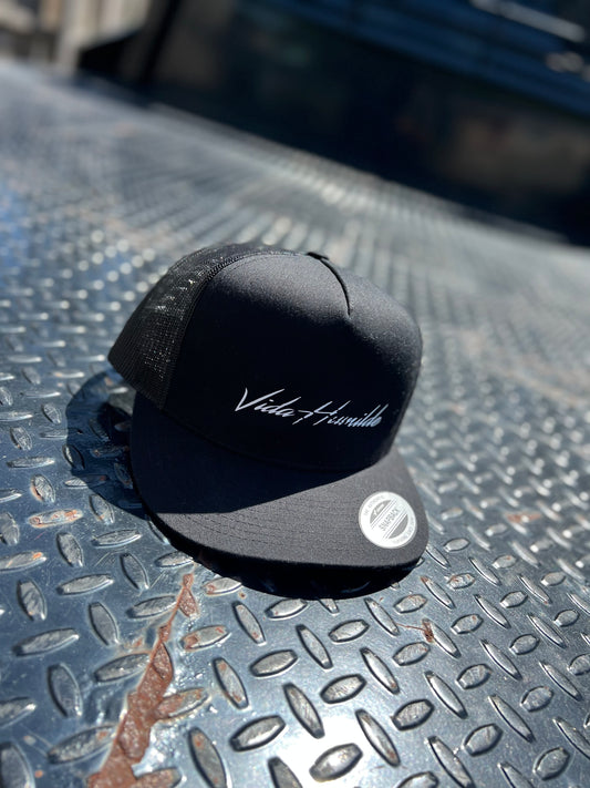 Black Vida humilde trucker hat